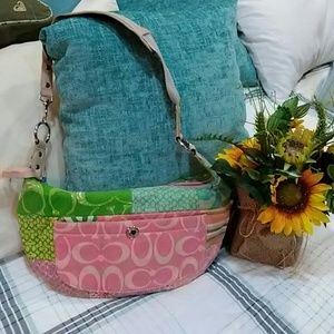 Small shoulder purse by couch